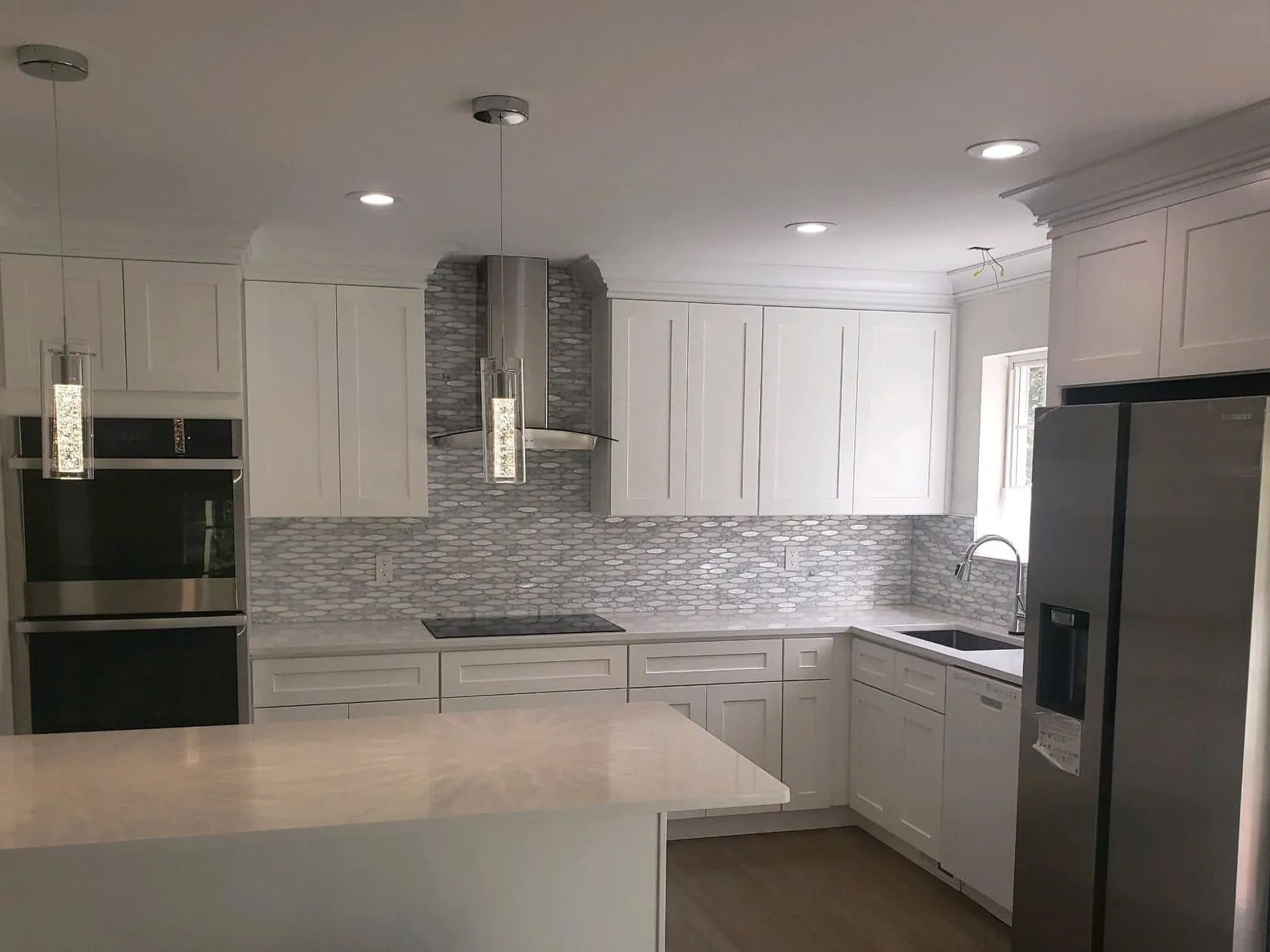 White Kitchen Remodel in Stamford, CT by Dream Kitchen Designs project photo