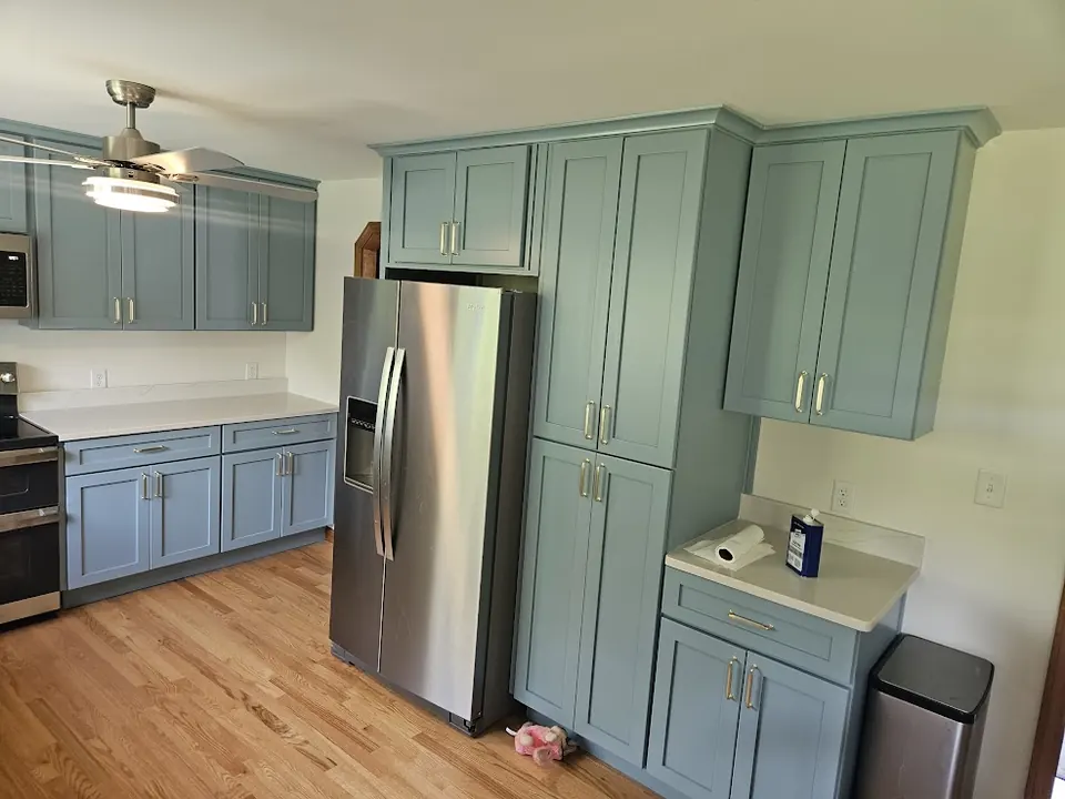 Blue-gray shaker kitchen cabinets