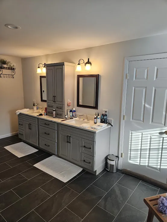 Double vanity bathroom with gray cabinets