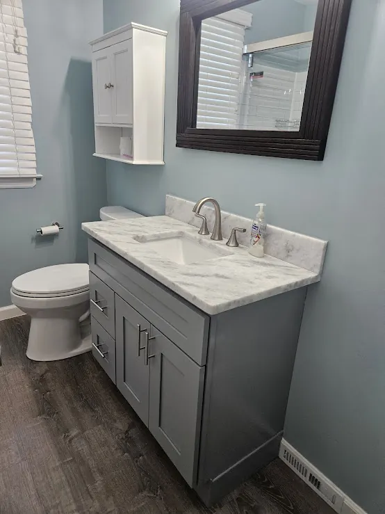 Gray shaker vanity with quartz top