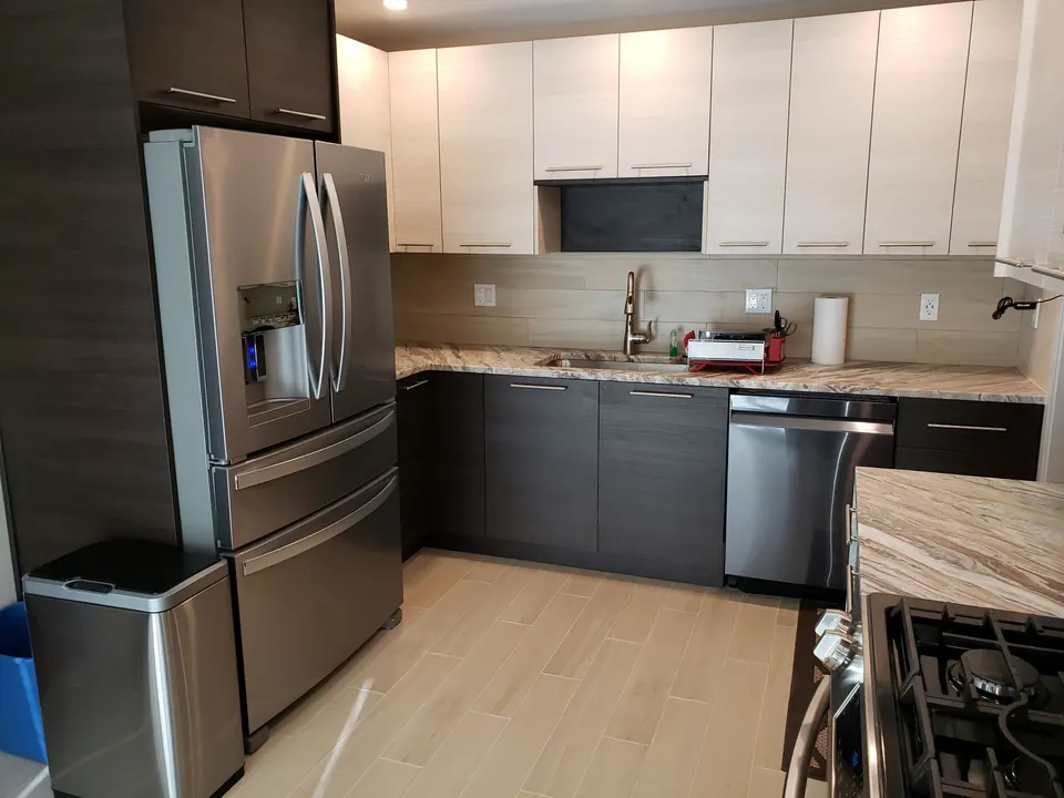 Modern flat-panel kitchen with exotic granite countertops
