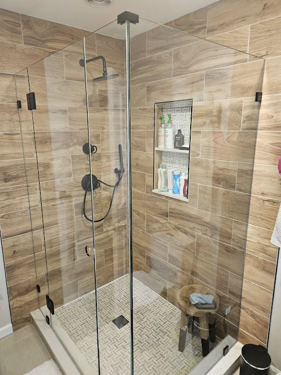 Frameless shower with wood-look tile